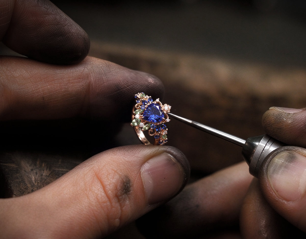 Jeweler finishing a ring by hand