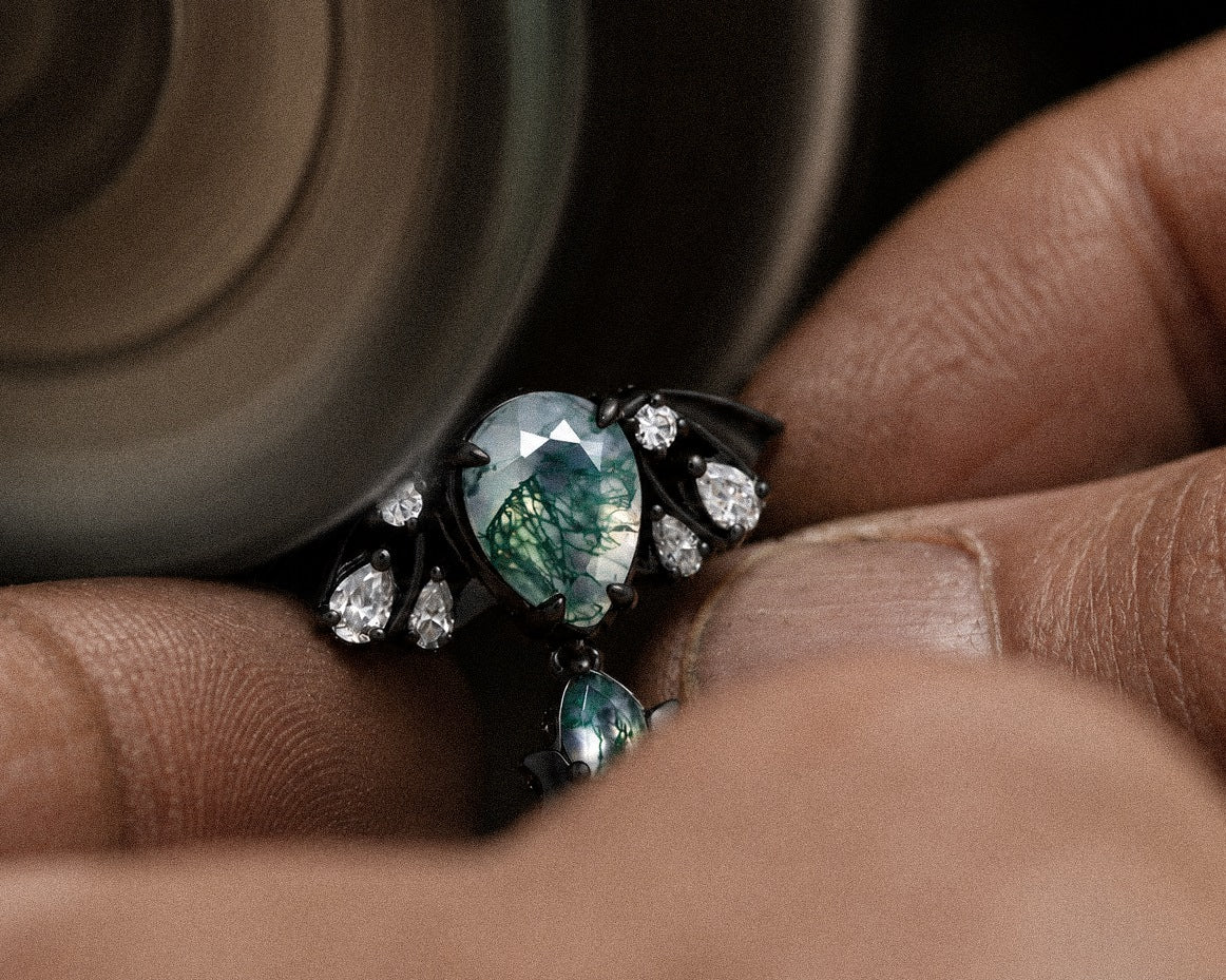 Jeweler finishing a ring by hand
