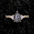 Pear Cut Salt & Pepper Diamond Three Stone Ring With Pavé Crossover Shank